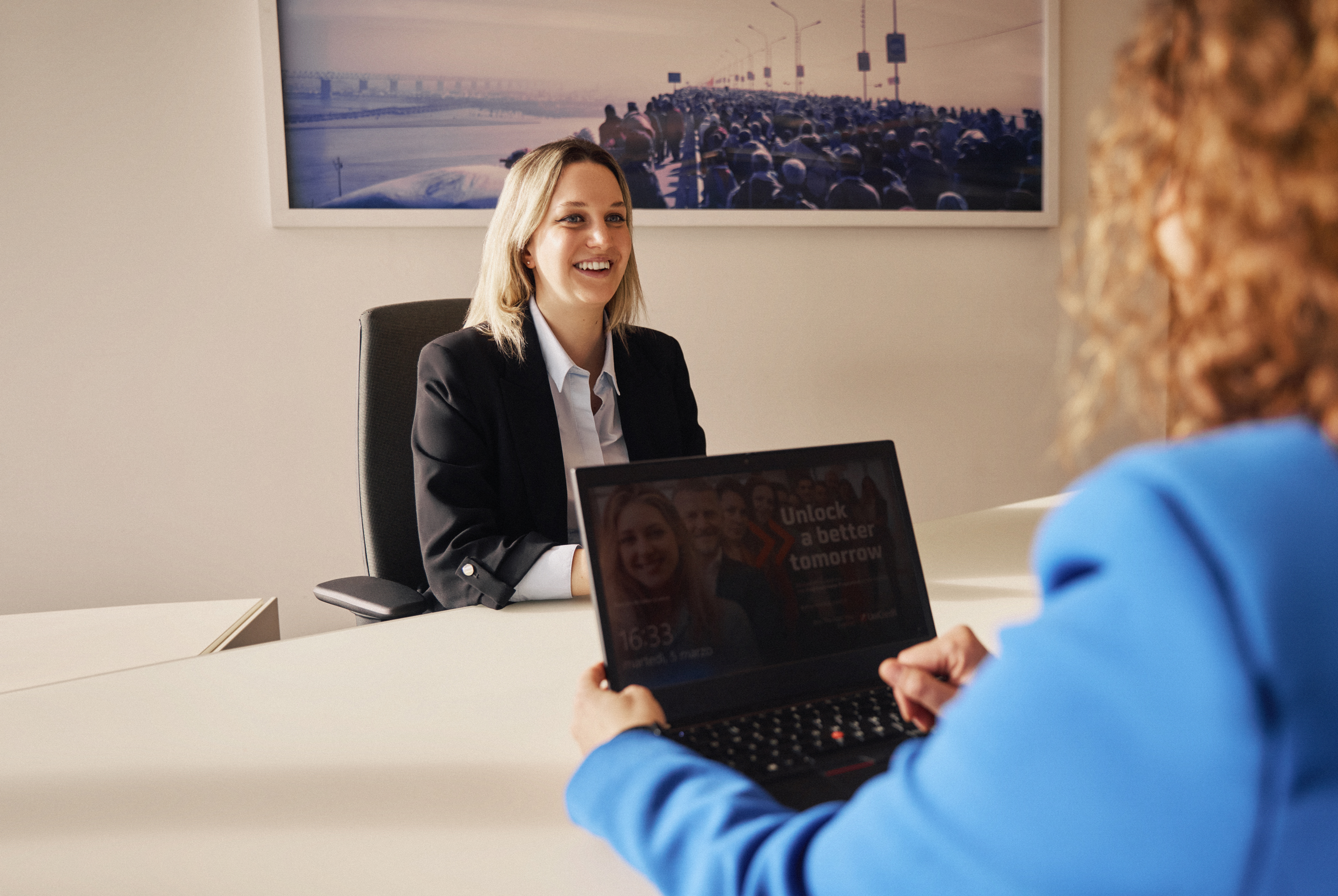 Smiling female candidate during job interview